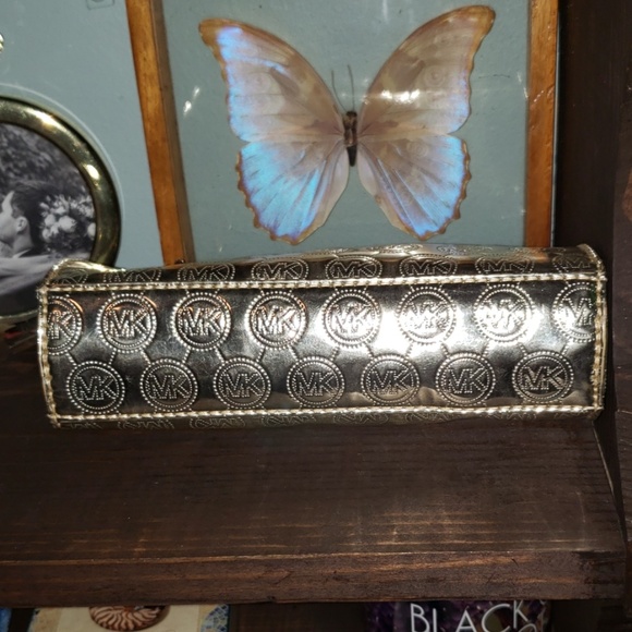 Michael Kors Metallic Logo Embossed Clutch Bag - Picture 3 of 8